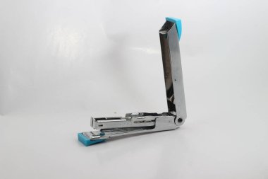Stainless steel stapler on a white background 