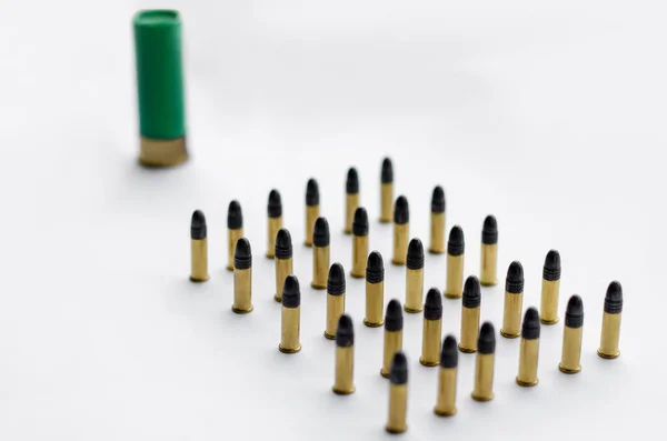 Set of bullets on white with blurred background — Stock Photo