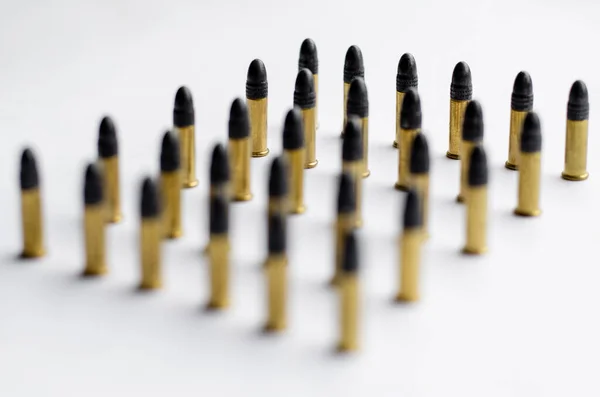 Set of blurred bullets on white — Stock Photo