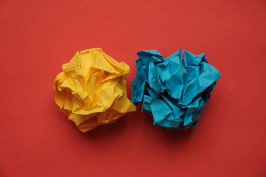 ball of colored paper in the form of a rose yellow-blue