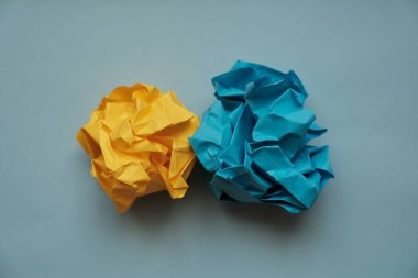 ball of colored paper in the form of a rose yellow-blue