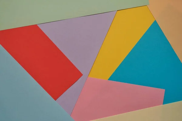 sheets of multi-colored paper in an abstract form