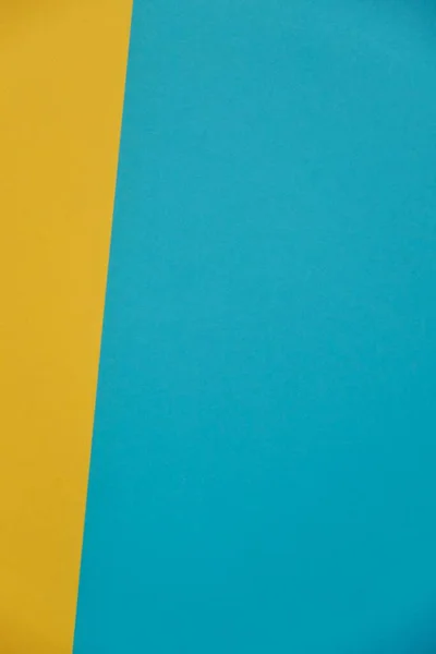 sheets of blue yellow paper