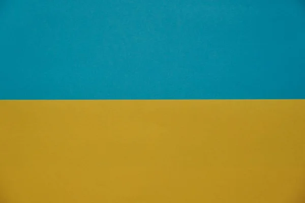 sheets of blue yellow paper