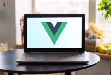 Vue JS logo at the laptop computer screen