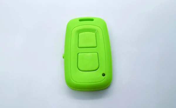 Πράσινο Bluetooth Τηλεχειριστήριο Κλείστρο Κάμερας Για Smartphone Απομονωμένο Στο Λευκό — Φωτογραφία Αρχείου