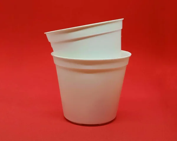 Small White Plastic Pot Isolated Red Background Realistic Isolated White — Stock Photo, Image