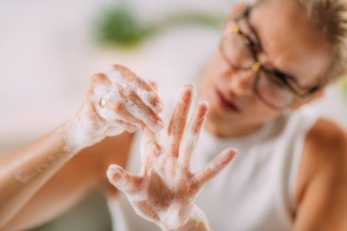 Obsessive compulsive disorder concept. Woman obsessively washing her hands. clipart