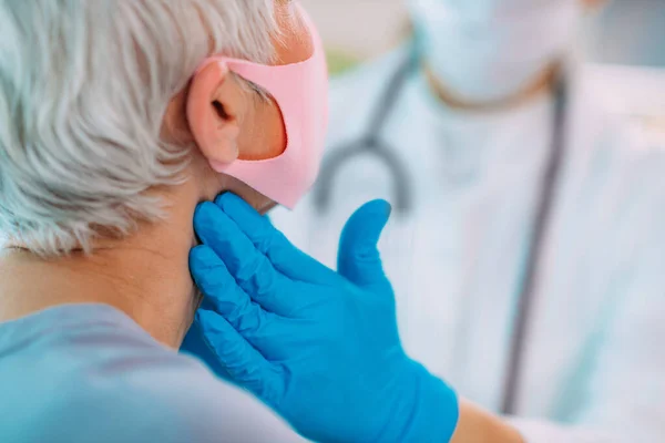 Doctor Examining Senior Woman Thyroid Gland Problem — Stock Photo, Image