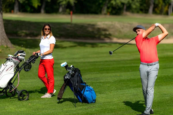 Smiling Golfing Couple Enjoying Game Golf — стоковое фото