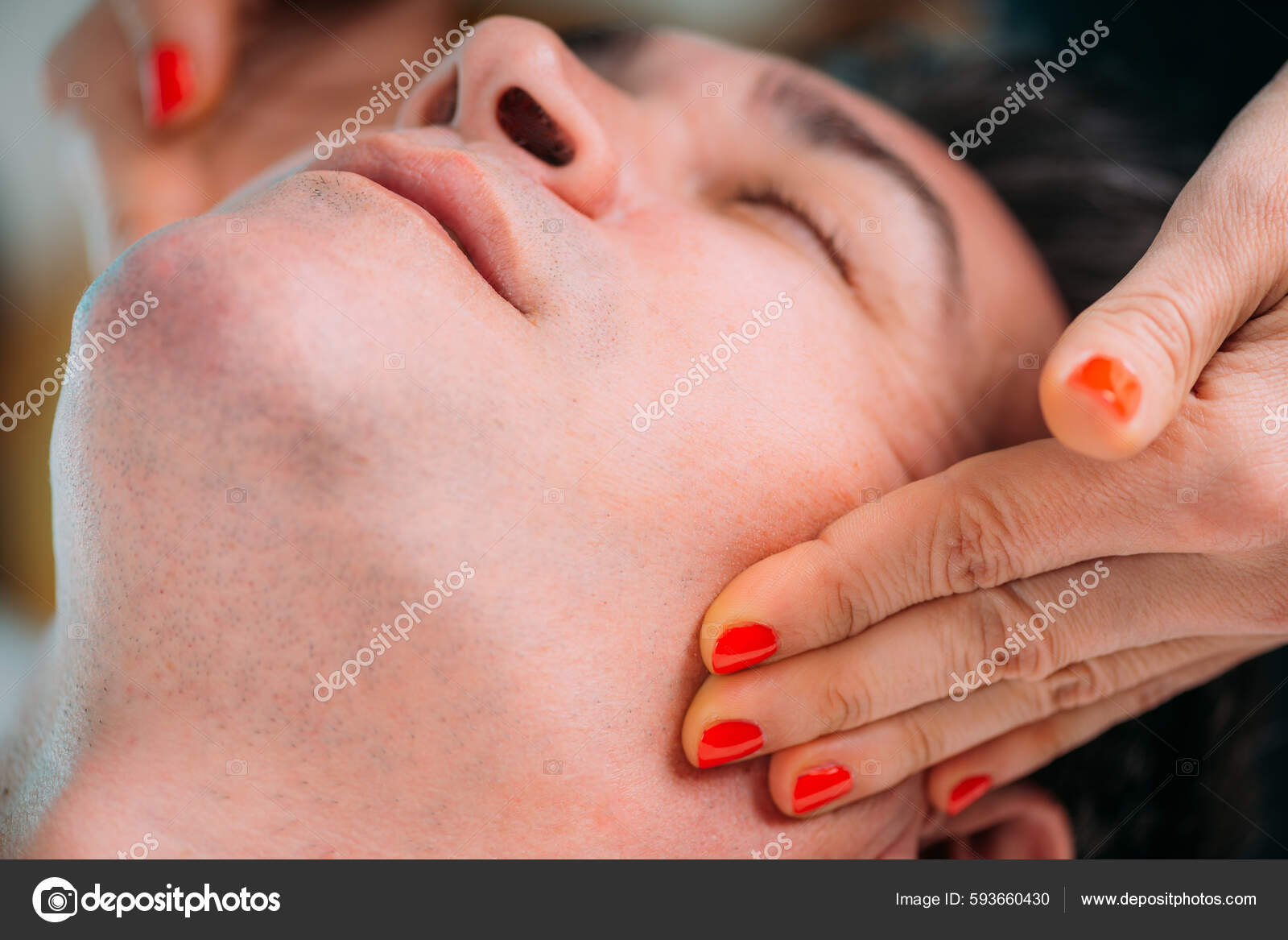Jaw Realignment Massage Therapy Stock Photo by ©microgen 593660430