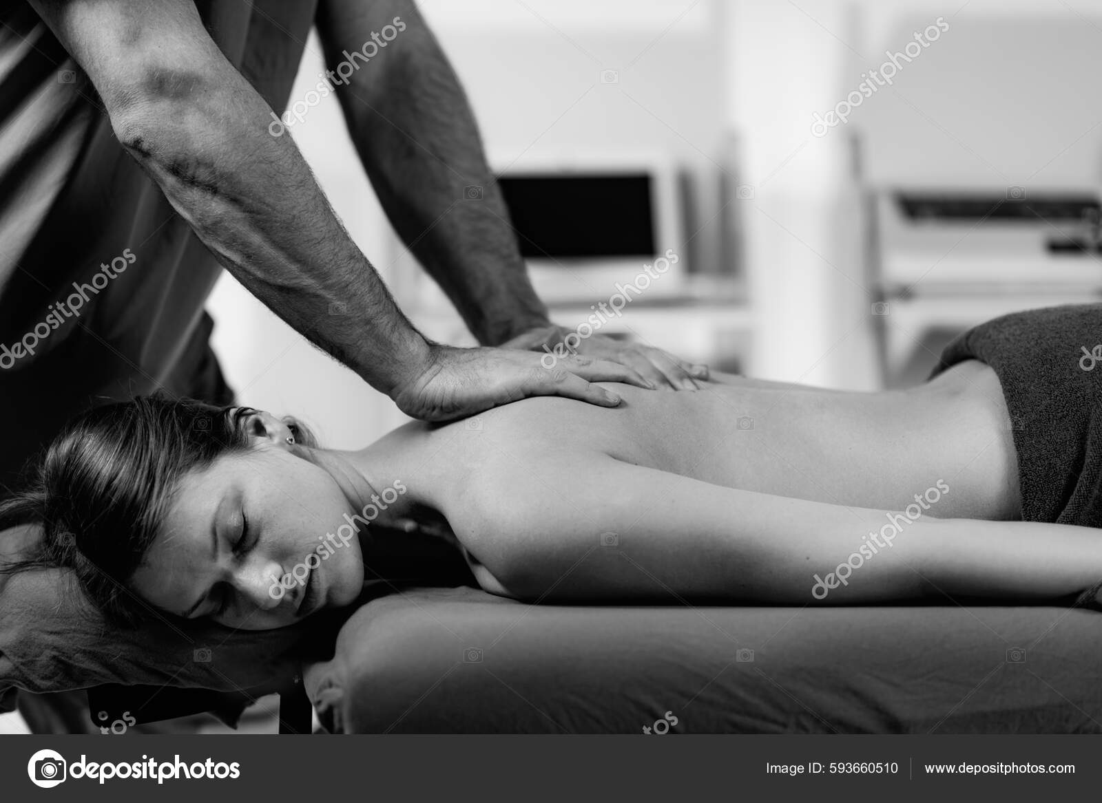 Relax Lower Back Massage Stock Photo by microgen