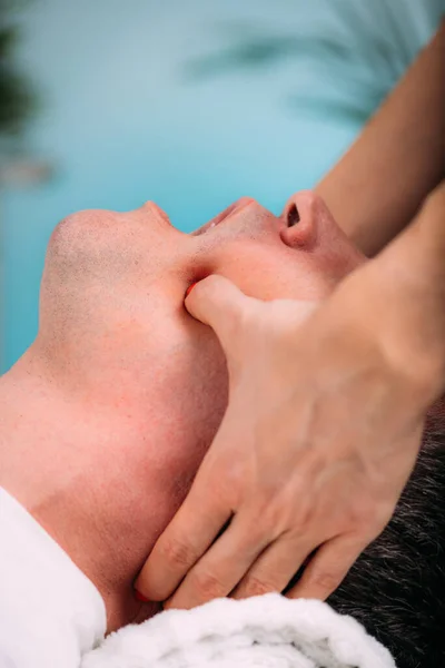 Jaw Realignment Massage Treatment Male Client — стоковое фото