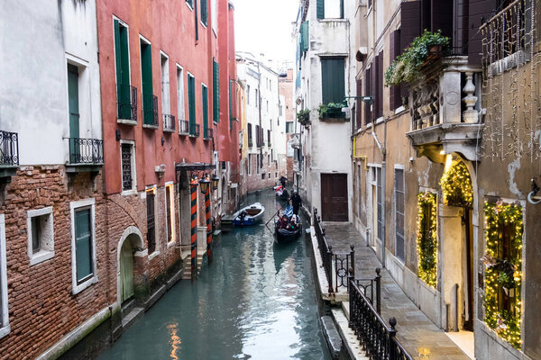Romantic sunset on the canal of old Venice, Italy