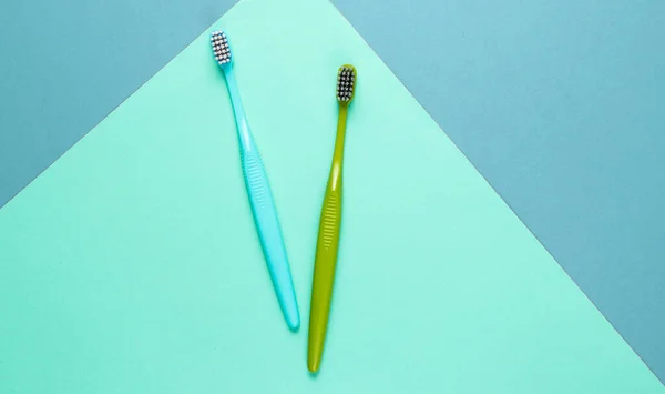 Two New Toothbrushes Colored Paper Background Minimalism Hygiene Concept — Stock Photo, Image