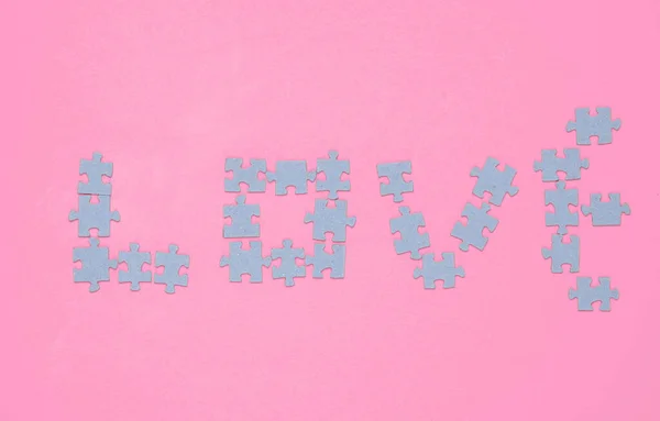 Particles Puzzle Shape Word Love Pink Background — Fotografia de Stock