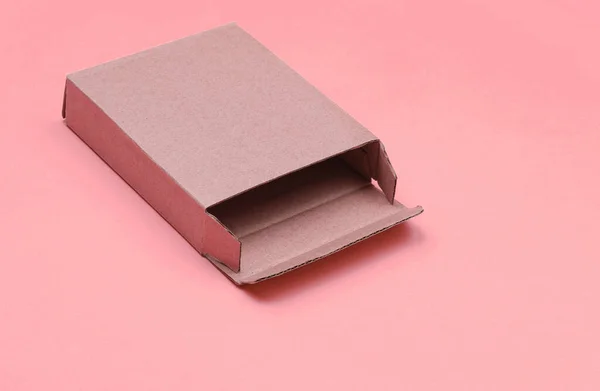 Empty Cardboard Box Vanilla Pink Paper Background — Stok fotoğraf