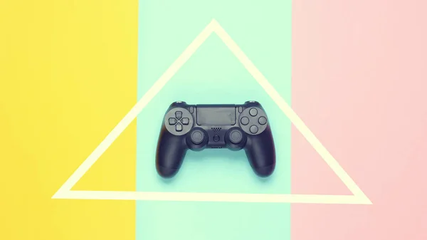 Gamepads Colored Paper Background Triangle Top View Minimalism — Fotografia de Stock