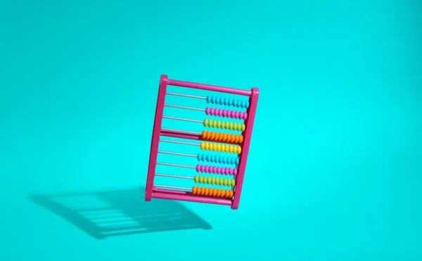 Spielzeugfarbener Abakus Auf Türkisfarbenem Hintergrund — Stockfoto