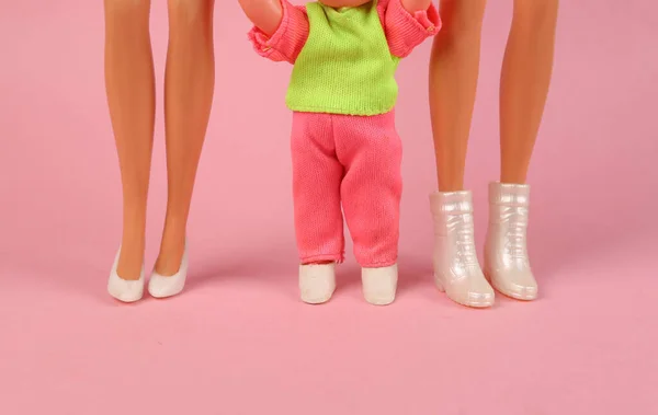 Lgbt Family Two Dolls Mom Her Little Daughter Pink Background — 스톡 사진