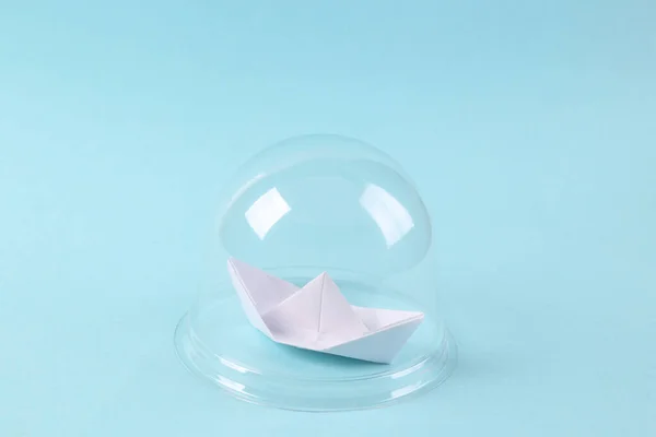 Paper Sailboat Transparent Dome Blue Background Protection Isolation Concept Minimal — стоковое фото