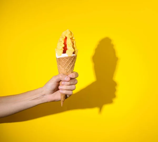 Female Hand Holds Cream Cone Yellow Bright Background Summer Background — Stock Photo, Image