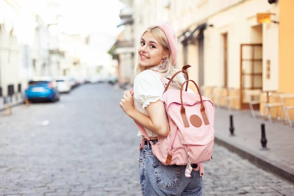 Cute Girl Beret Backpack Looks Camera Smiles European Street — Stockfoto