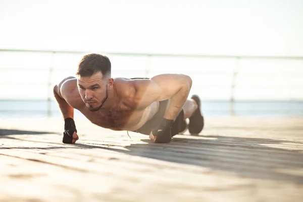 Athletic Man Naked Torso Practicing Push Ups His Fists Early — Stockfoto