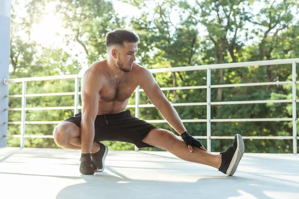 Muscular Man Naked Torso Practicing Stretching Outdoors —  Fotos de Stock