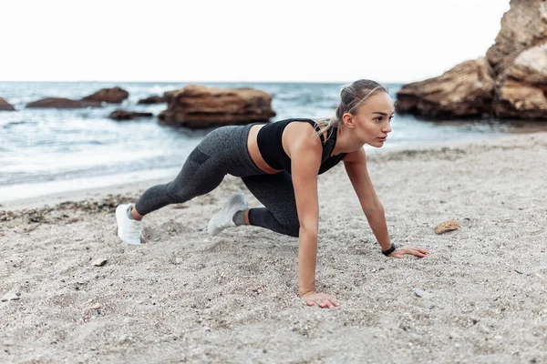 Beautiful Young Fit Woman Sportswear Exercising Doing Push Ups Alone — Stockfoto