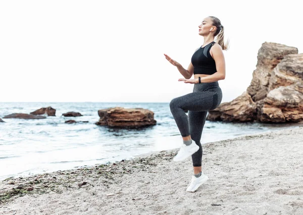 Fit Woman Doing Warm Exercises Wild Beach — Stockfoto