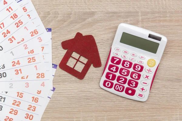 Paper Calendar Calculator House Figure Table Housing Rent — Φωτογραφία Αρχείου