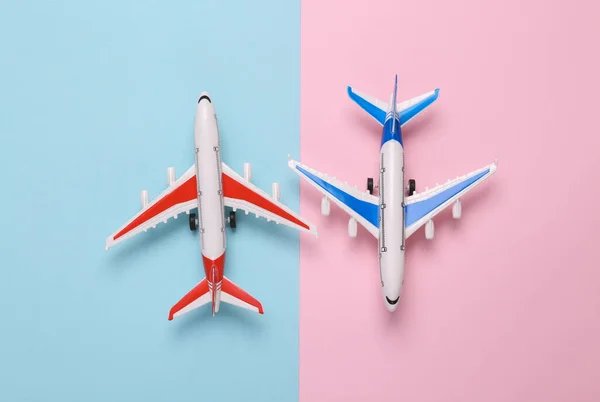 Two Toy Model Airplanes Blue Pink Background Travel Concept Flat — Stock Photo, Image