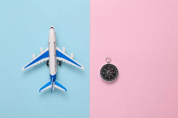 Model Airplane Compass Pink Blue Background Travel Concept Flat Lay — Foto de Stock