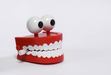 Funny, joke clockwork jaw isolated on white background