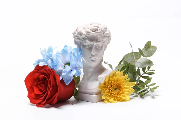 Aesthetic still life, David bust vase with flowers isolated on a white background. Romantic, love concept