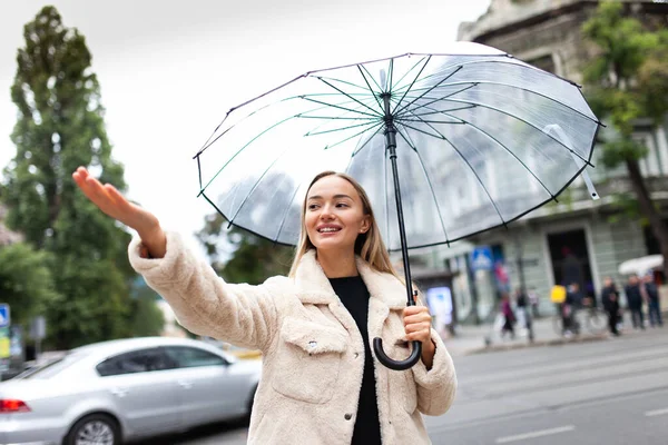 Fashion Blonde Woman Transparent Umbrella Checks Rain City Lifestyle Rainy — Fotografia de Stock