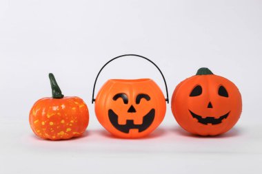 Halloween jack pumpkin bucket with decor isolated on white background. Trick or Treat