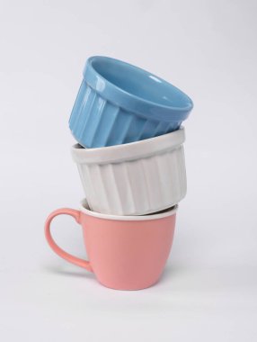Stack of ceramic tableware isolated on white background