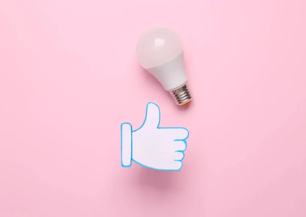 Daumen Hoch Benachrichtigungssymbol Mit Glühbirne Auf Rosa Hintergrund Soziale Medien — Stockfoto