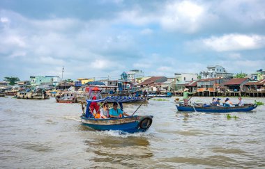 Cai Rang, Vietnam - November 25, 2019: A boat with tourits in the floating markets on the Mecong river