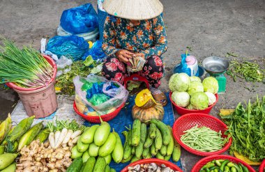 Cai Rang, Vietnam - November 25, 2019: A colorful food market on the Mecong river bank