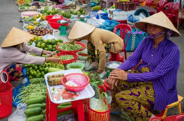 Cai Rang, Vietnam - November 25, 2019: A colorful food market on the Mecong river bank