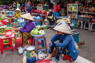 Cai Rang, Vietnam - November 25, 2019: A colorful food market on the Mecong river bank