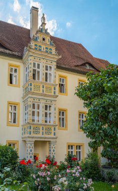 Germany, Rothenburg ob der Tauber, a religious house with garden nex to the St.Jakobs Lutheran church