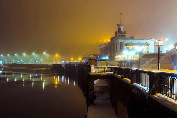 View of the night city in the fog. Foggy city in winter, Fog in winter in the city.