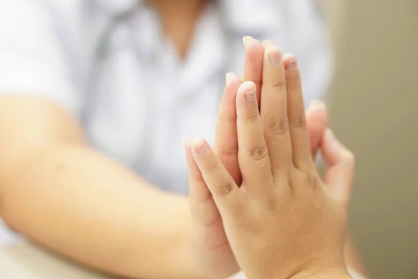 Medical:  Hand touch to encourage patients in the clinic, close-up, motivation technique, Thank you.