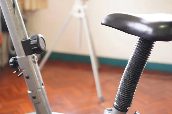 Sport: The picture shows the home gym exercise bike seat, close up, exercise at home.