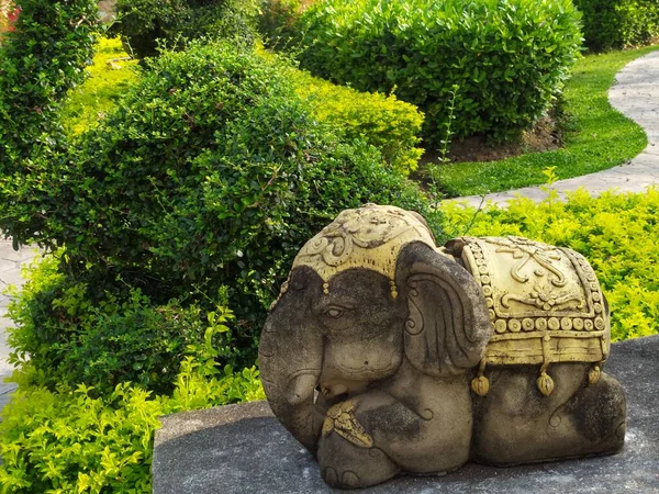 Travel: Little elephant statue in the park, Chiangmai, Thailand.