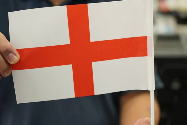 An image showing the  flag of England, God Save the King.